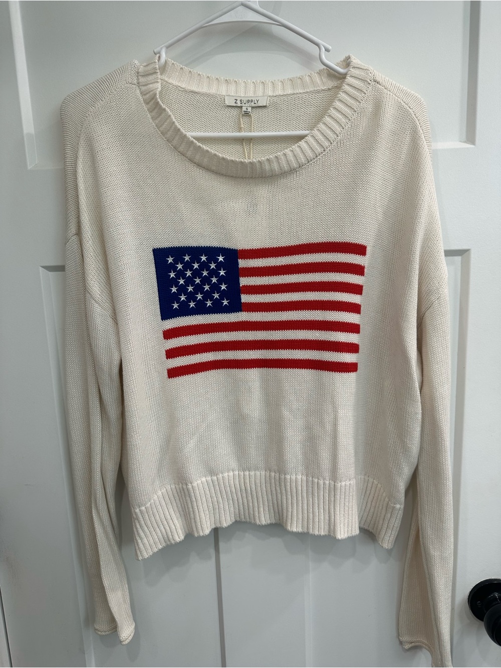 Z Supply Cream Crewneck Sweater with Red & Blue Flag Motif